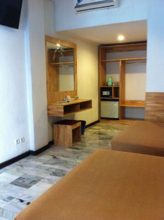 Hotel Karthi Kuta Кута Стая снимка